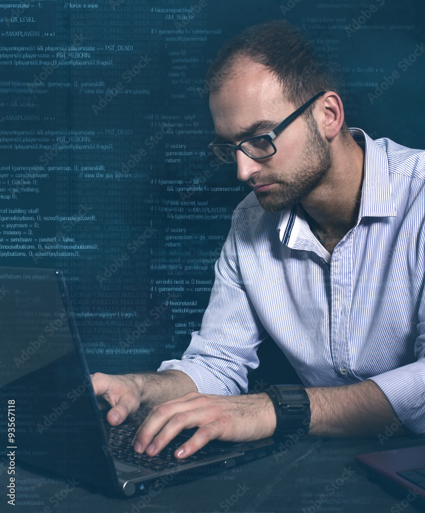 hacker at work with graphic user interface around hacker at work with graphic user interface around