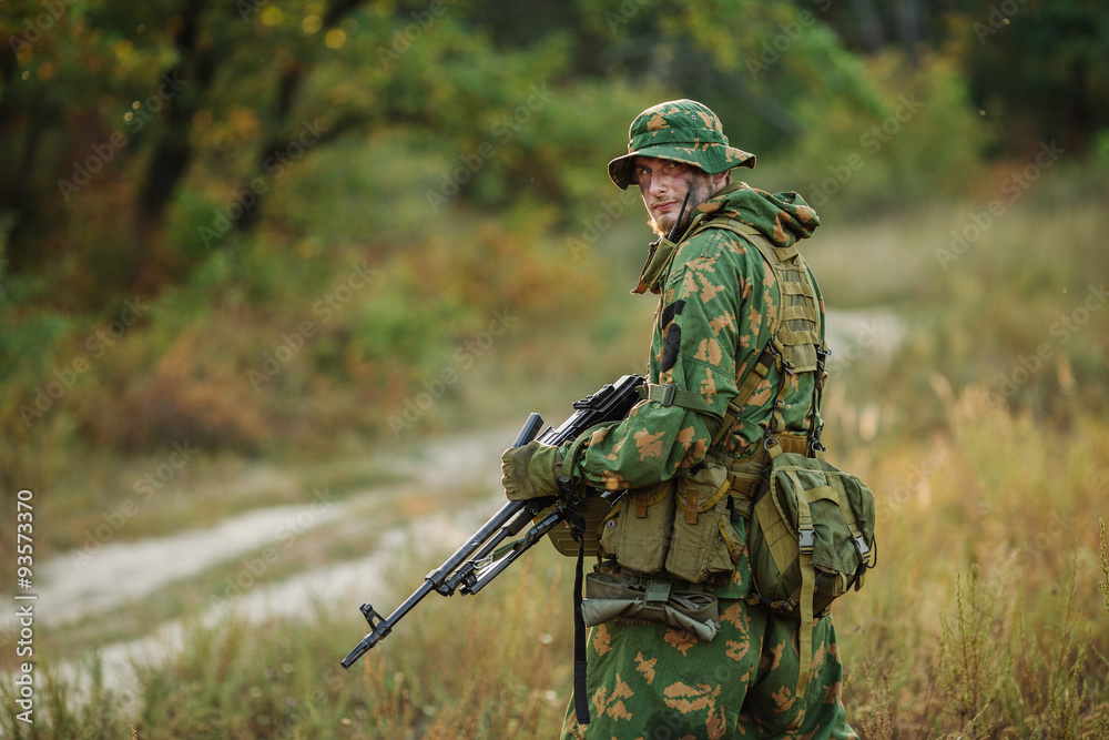 russian soldier in the battlefield with a rifle