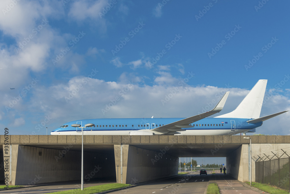 airplane over highway airplane over highway