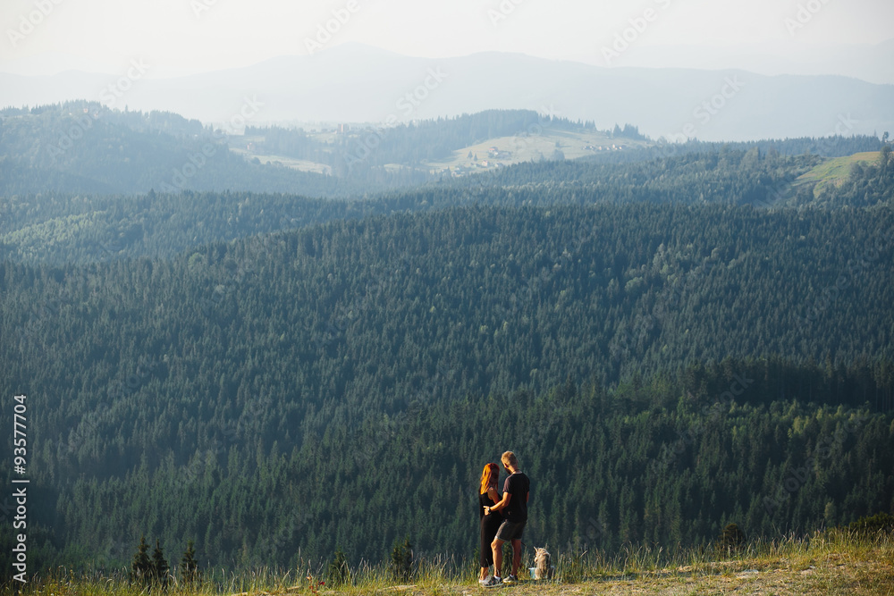 Photo of a couple in the mountains