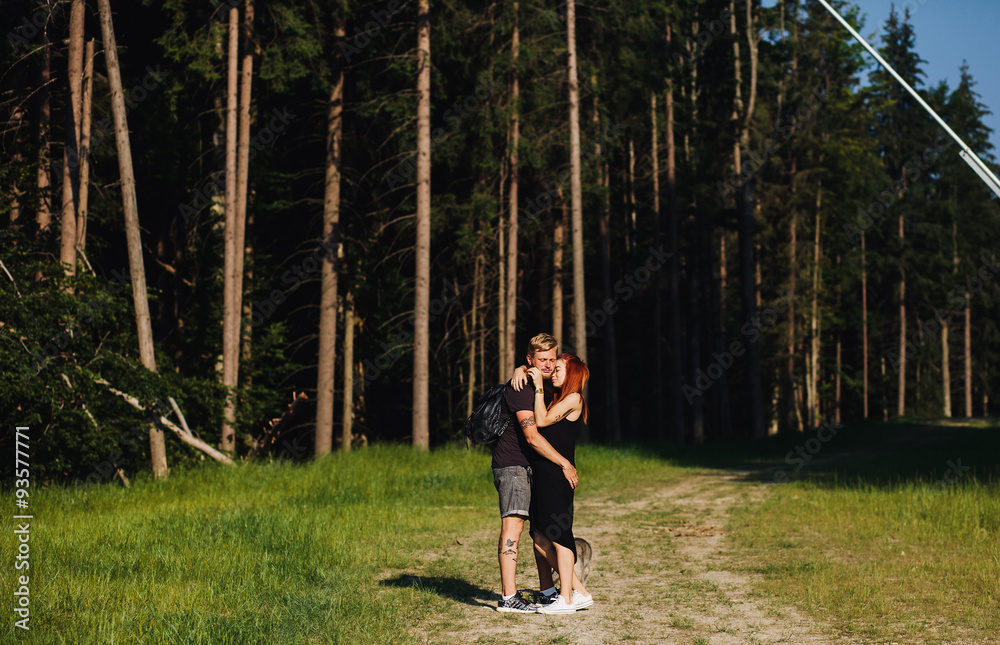beautiful couple standing in a forest beautiful couple standing in a forest
