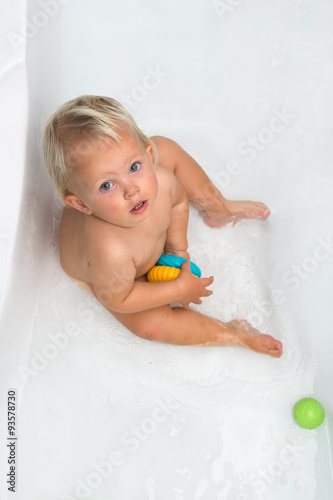 Baby girl is having a bath