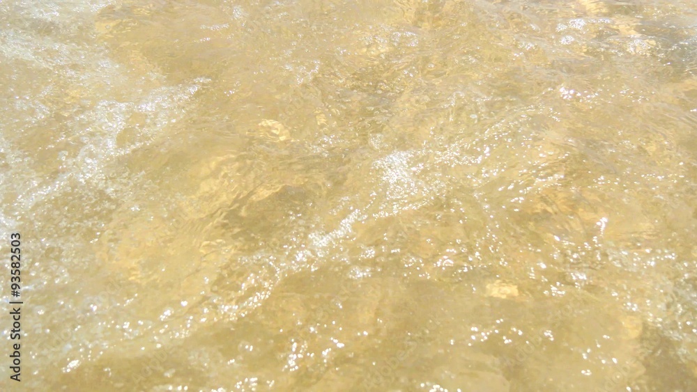 Clear water waves on the shore of the beach (4K) Clear water waves on the shore of the beach (4K)