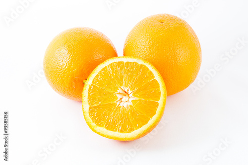 Orange fruit on white background, fresh and juicy.