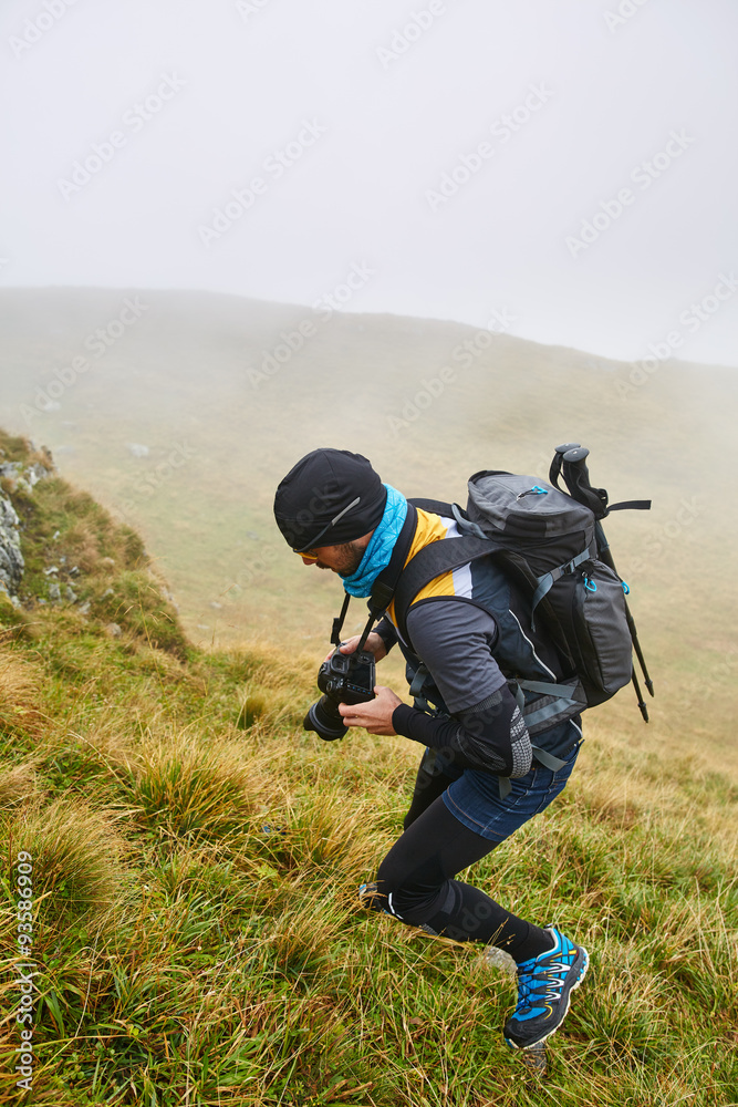 Caucasian hiker with backpack
