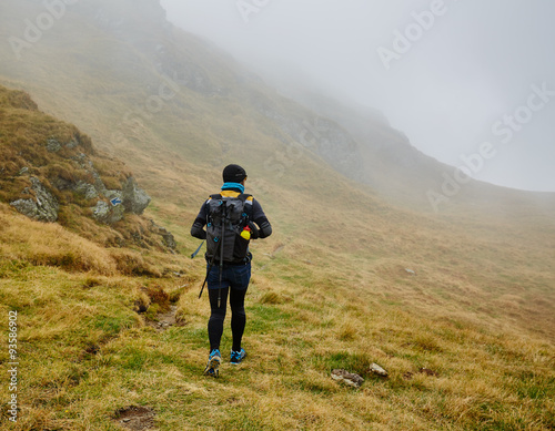 Caucasian hiker with backpack