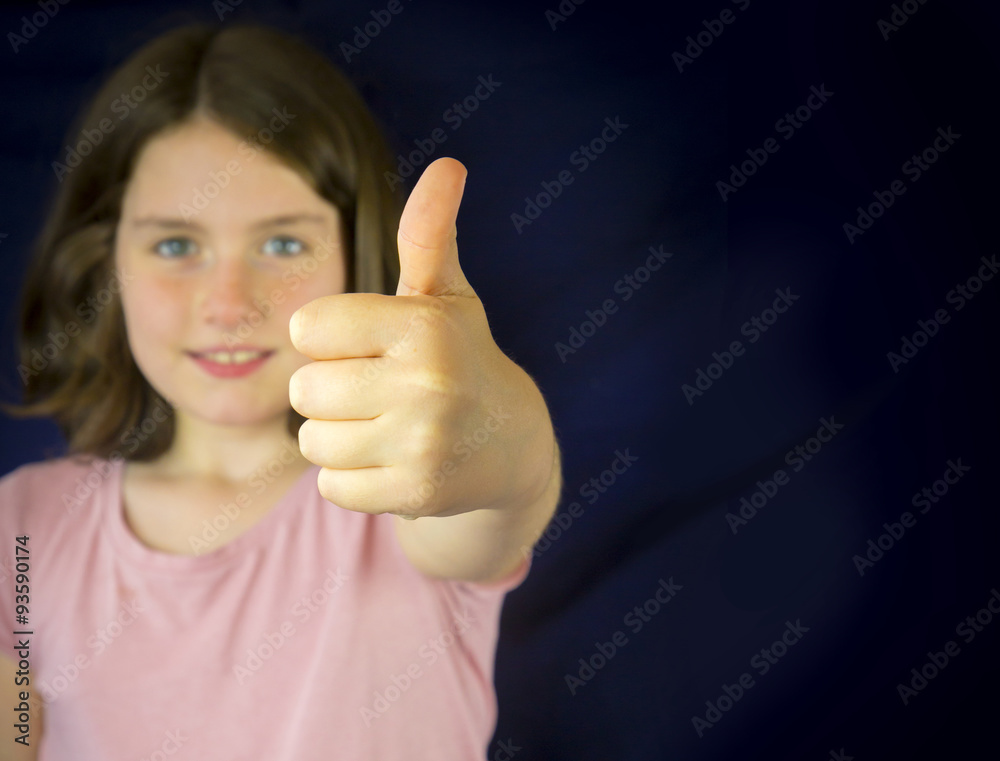 Portrait of beautiful little girl showing ok sign Portrait of beautiful little girl showing ok sign