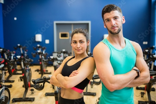 Focused couple working out together