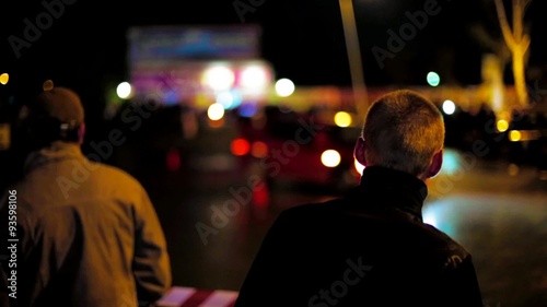 People Watching Car Drifting At Night