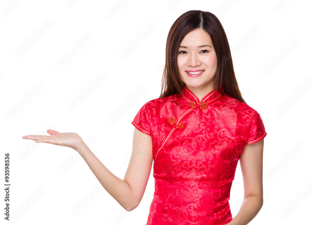 Woman with chinese traditonal costume show with the open hand pa Woman with chinese traditonal costume show with the open hand pa