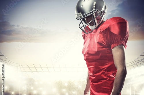 American football player in red jersey looking down © vectorfusionart