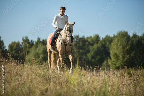 Attractive man on horseback