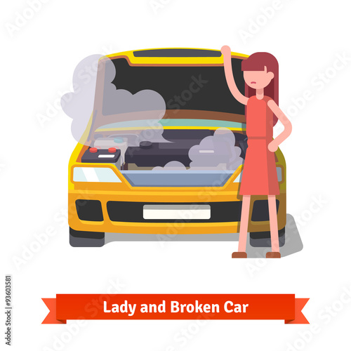 Woman looking under the hood of her broken car