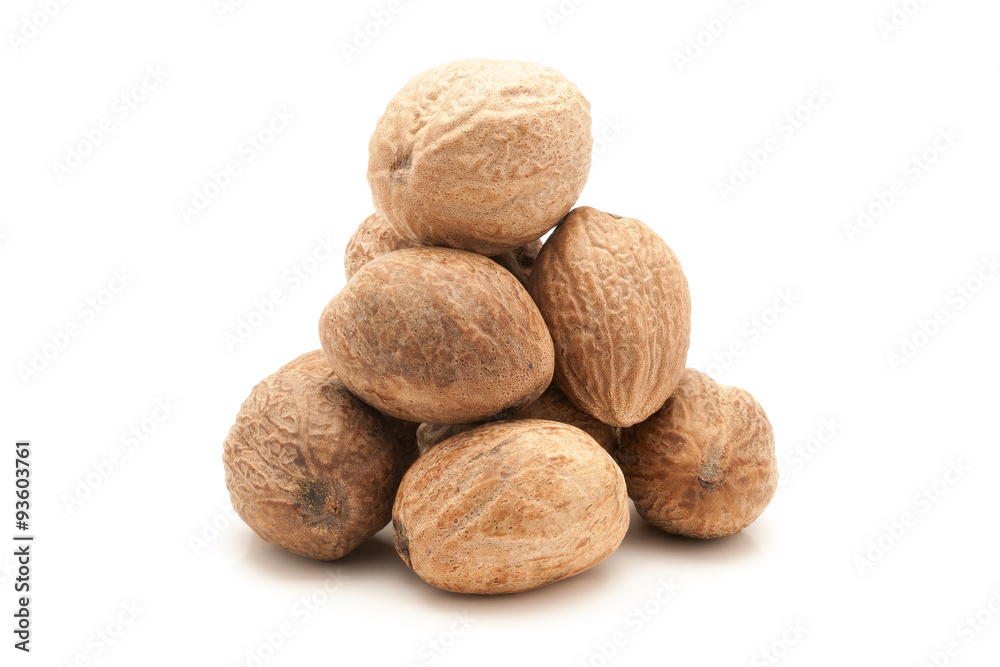 Pile of Organic Nutmeg Seed or Jaiphal (Myristica fragrans) isolated on white background. Pile of Organic Nutmeg Seed or Jaiphal (Myristica fragrans) isolated on white background.