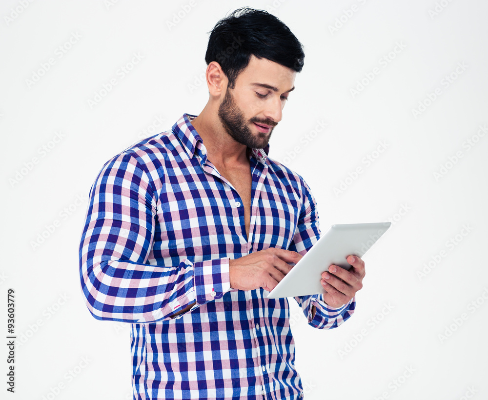 Portrait of a young man using tablet computer Portrait of a young man using tablet computer