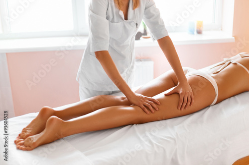 Body care. Legs massage in spa salon