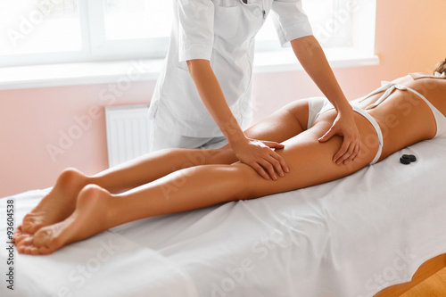 Spa woman. Body care. Legs massage in spa salon