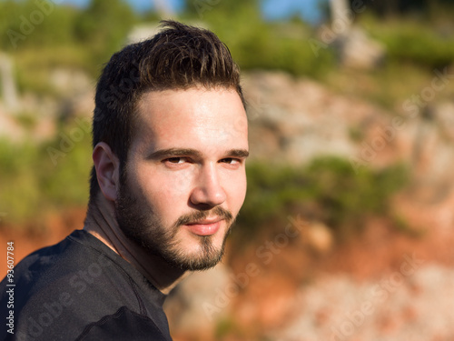 Portrait Of Male Runner in nature after jogging