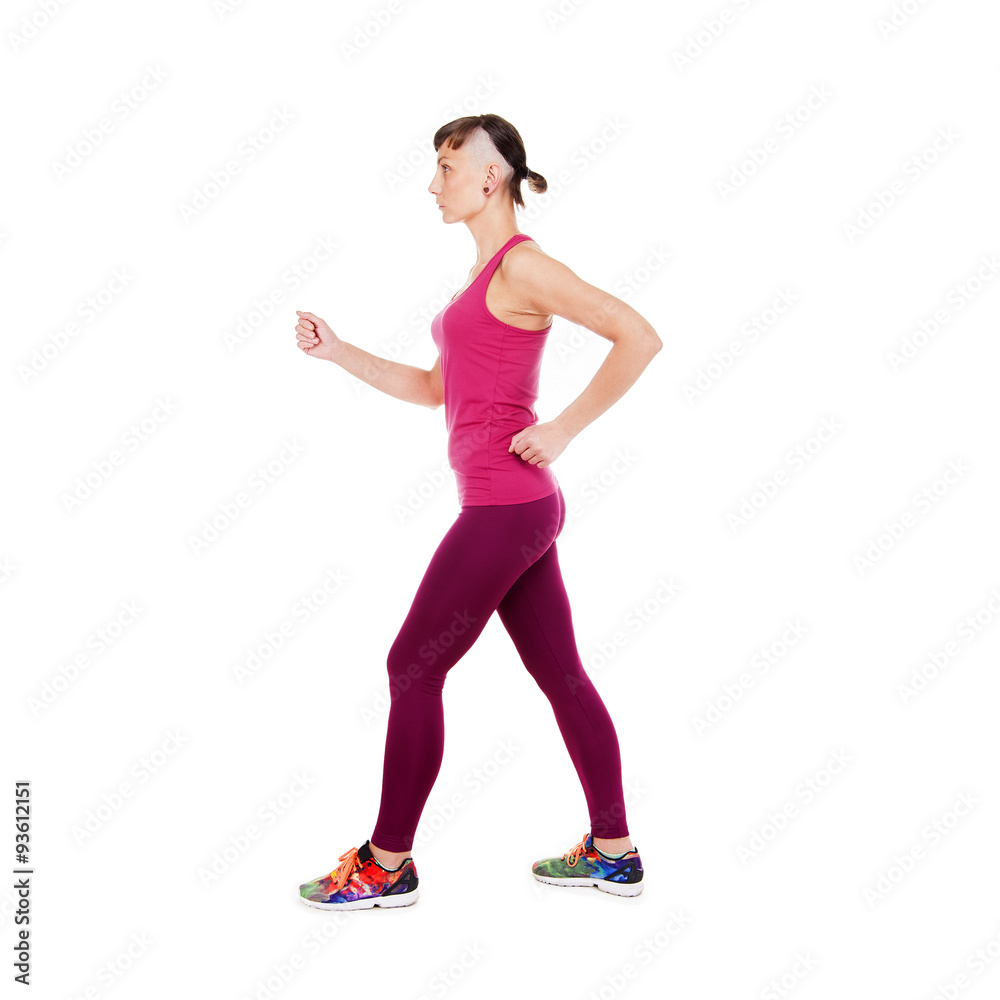 Young running woman in fitness outfit, running to aside. Isolate Young running woman in fitness outfit, running to aside. Isolate