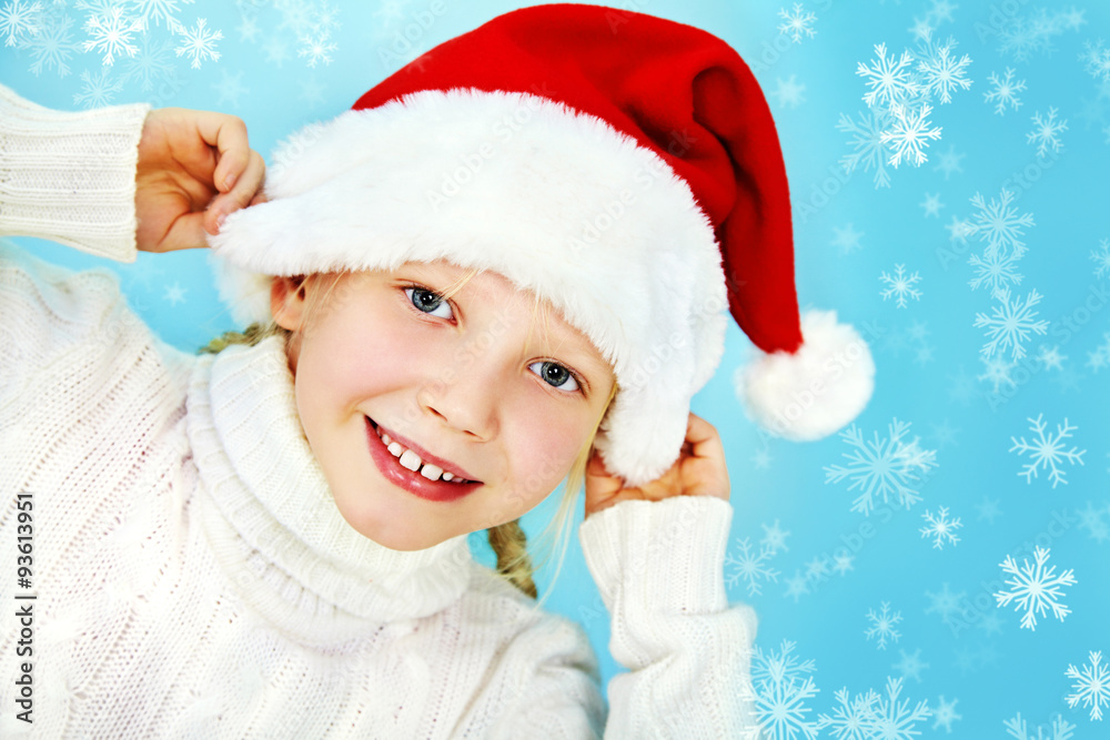 Smiling girl in Santa hat Smiling girl in Santa hat