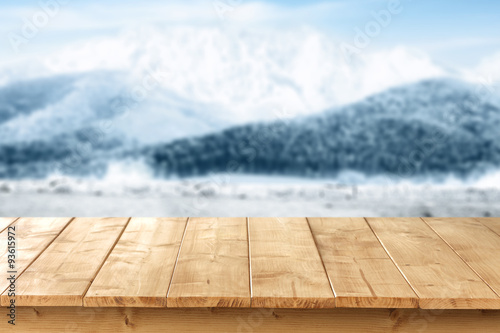 wooden table place and snow  © magdal3na