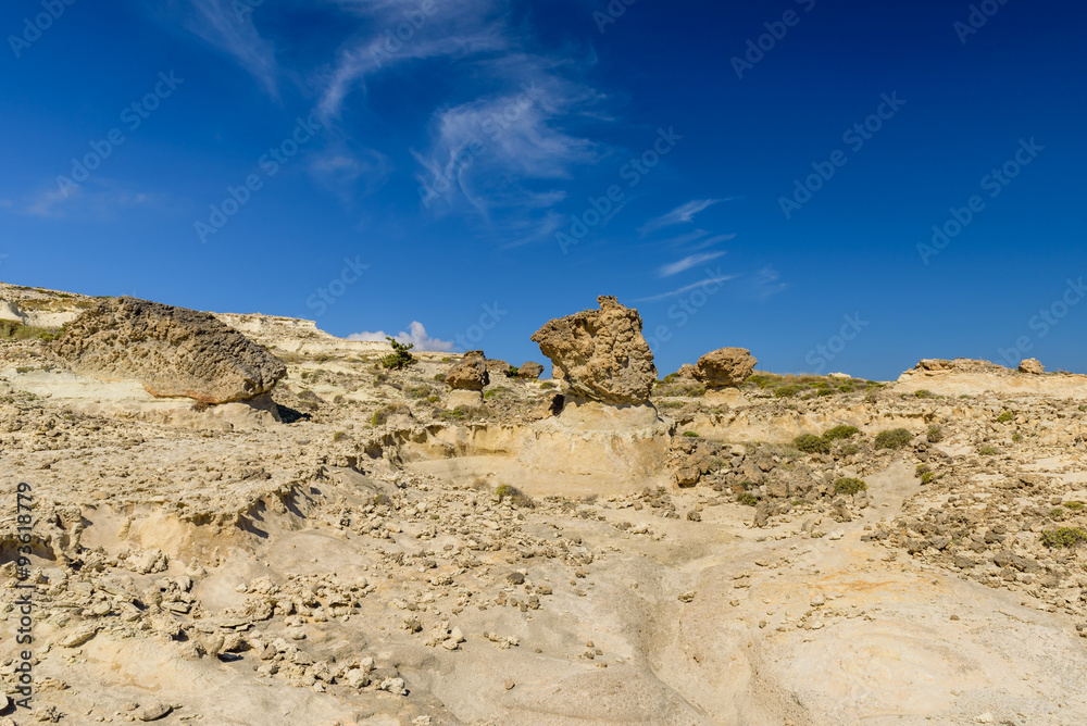 Picturesque mountains and rocks of unusual bizarre in Sarakiniko, Milos, Cyclades, Greece.