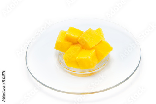 mango slice in plate isolated on white background