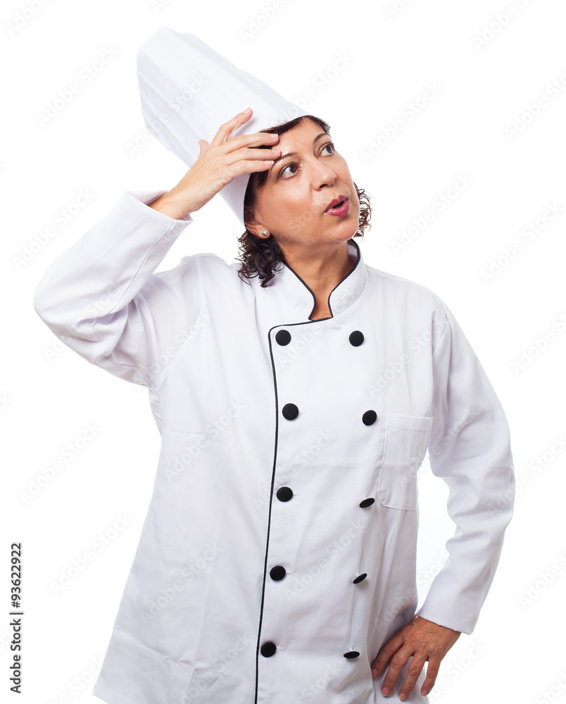 portrait of a mature cook woman with doubtful gesture on a white background portrait of a mature cook woman with doubtful gesture on a white background