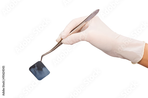 Doctor holding dental x-ray on white background with path