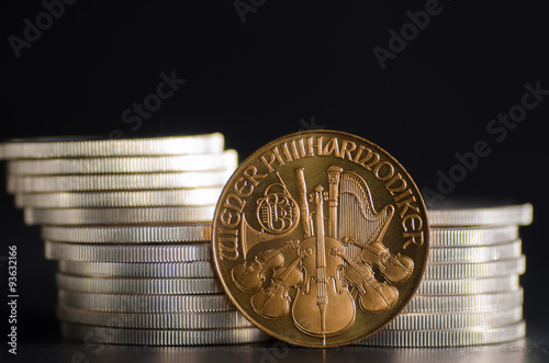 Tablou pe pânză Austrian Philharmonic Gold Coin infront Silver Coins