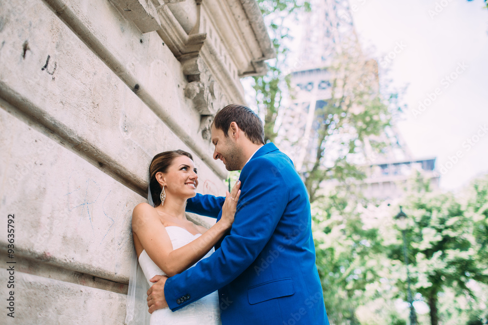Just married couple near the Eiffel tower in Paris Just married couple near the Eiffel tower in Paris