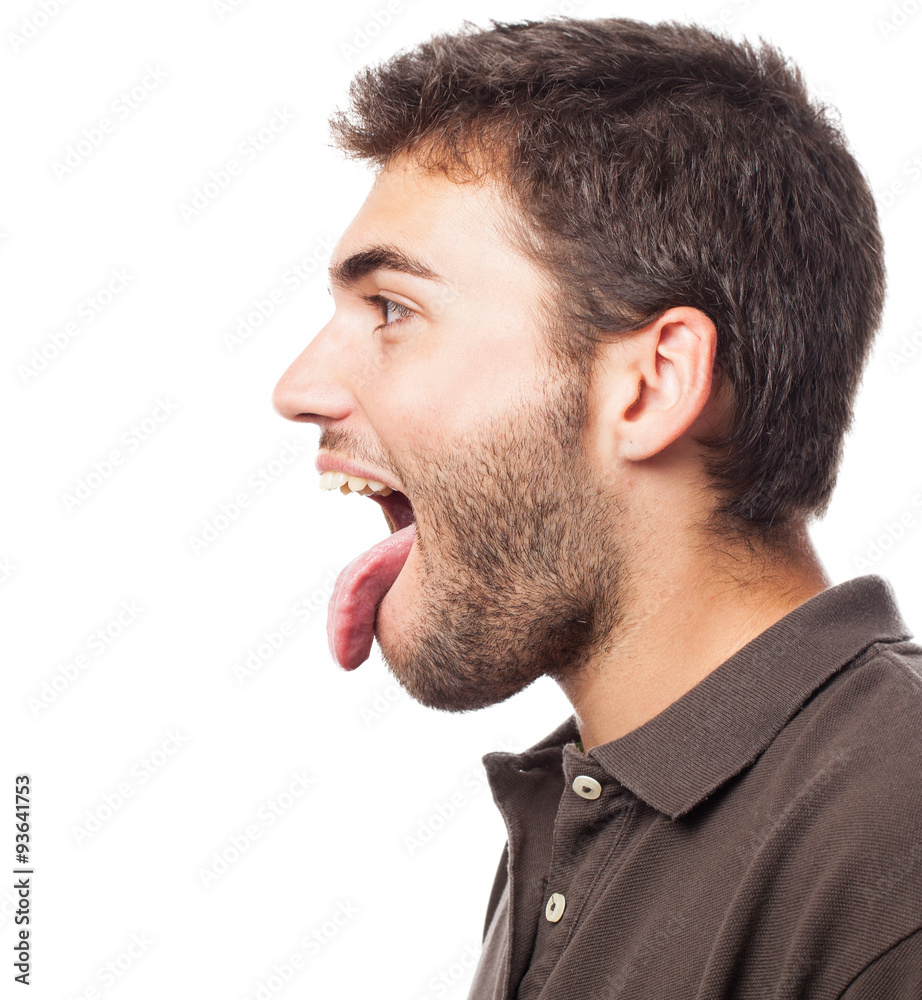 Fototapeta premium portrait of a handsome man kidding showing his tongue