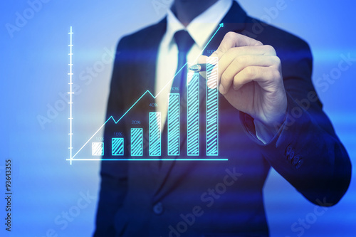 Closeup image of businessman drawing graph,business strategy as