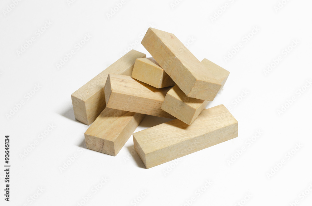 Isolated of pile of wooden blocks on white background