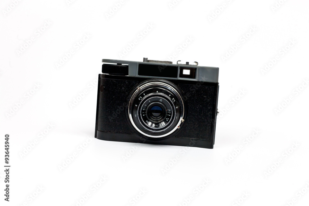 Retro photo camera on a white background