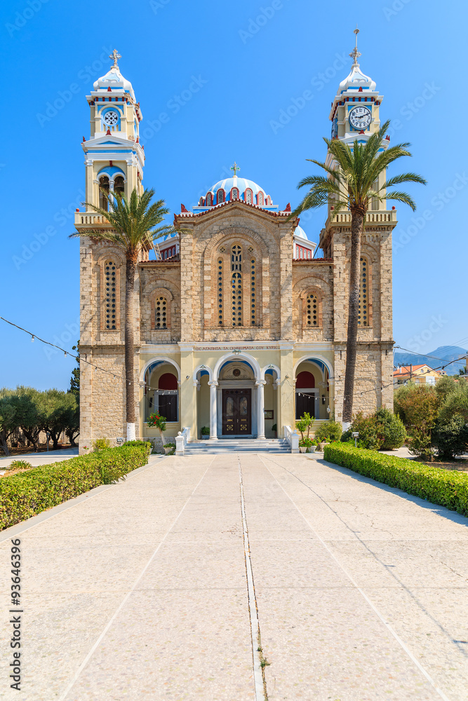 Square with beautiful old church in Karlovasi town, Samos island, Greece