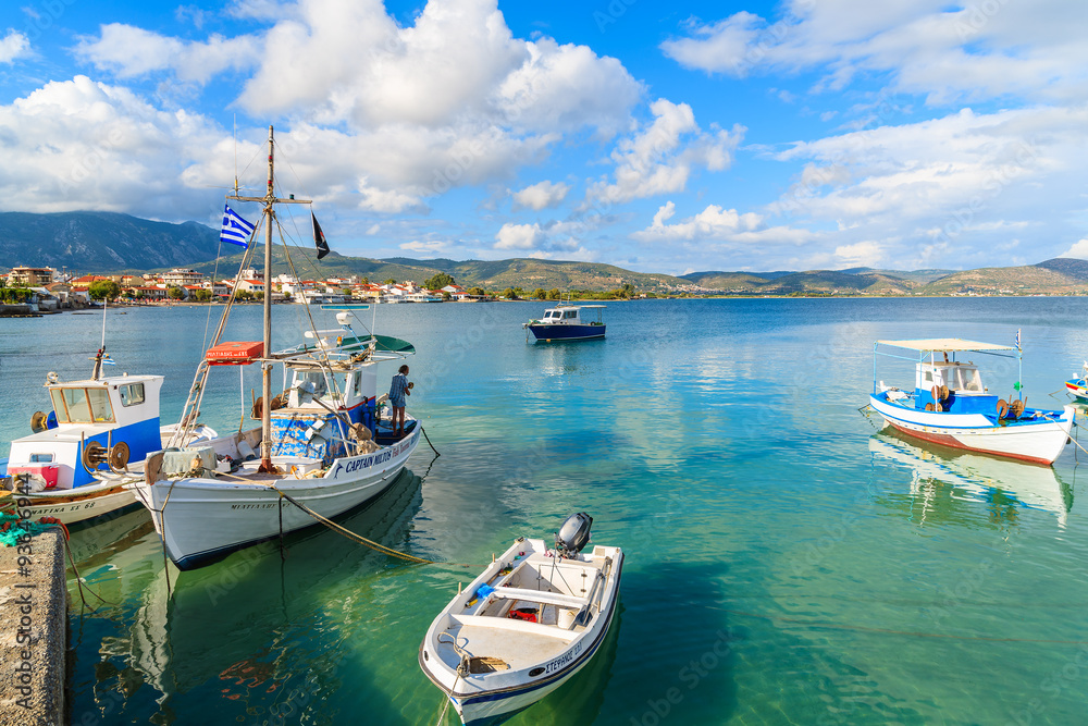 Greek fishing boat mooring in port on Samos island, Greece.