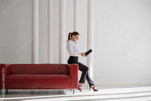 businesswoman holding paperwork