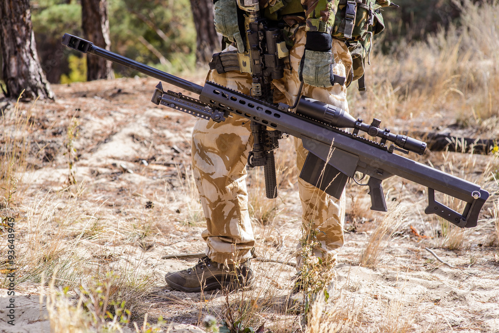 Army Sniper With Large Caliber Sniper Rifle Seeking Killing Enemy