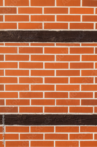 Background of  brick wall with wooden post © mariusz szczygieł