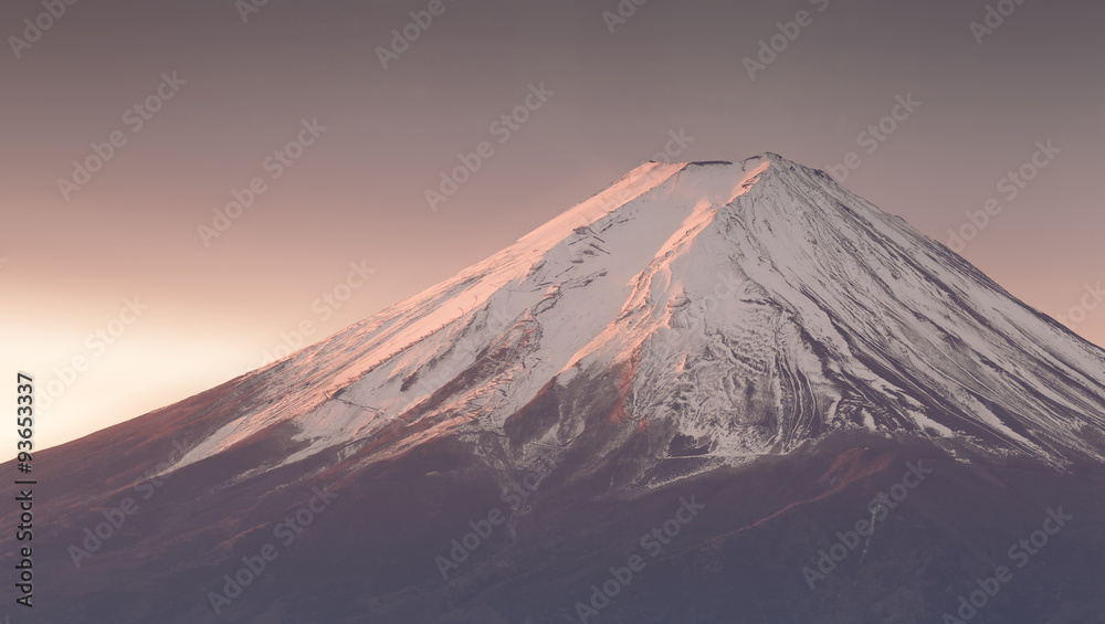 Top of Mt. Fuji with snow before sunrise in winter season