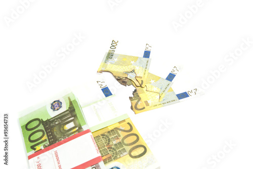 pack of euros and burned bills