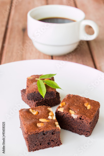 brownies with cup of coffee on table