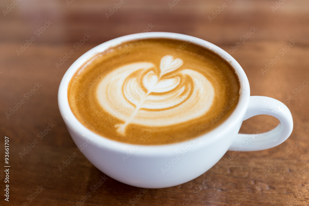 art latte coffee on white cup art latte coffee on white cup