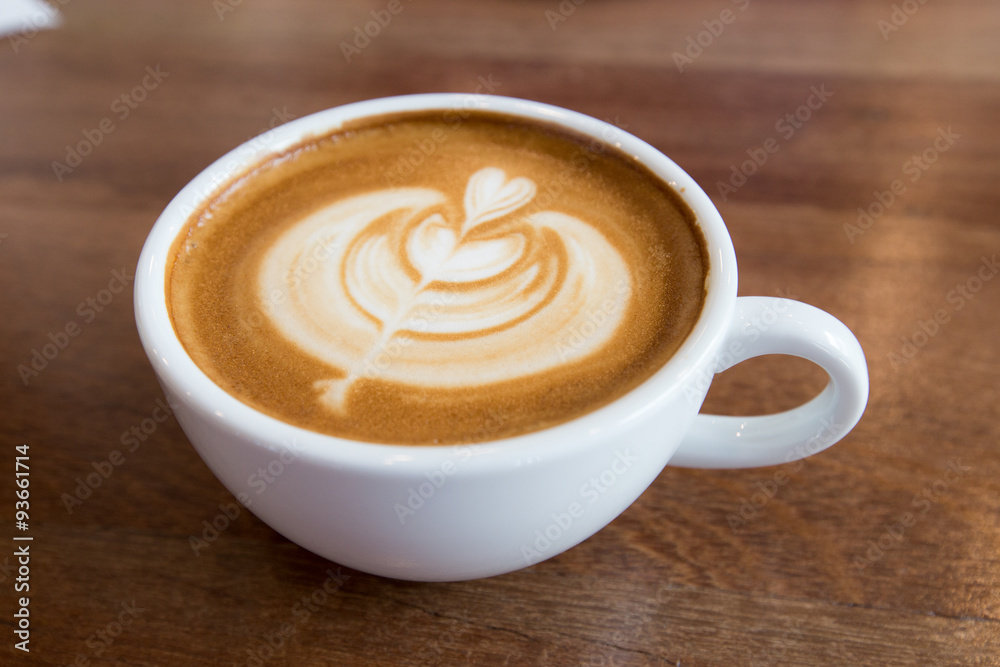 art latte coffee on white cup art latte coffee on white cup