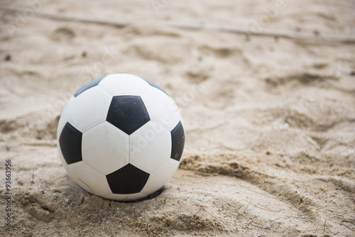 football on sand beach