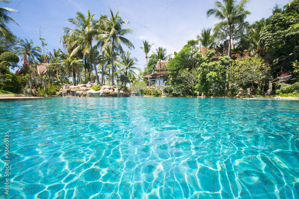 big swimming pool in tropical resort