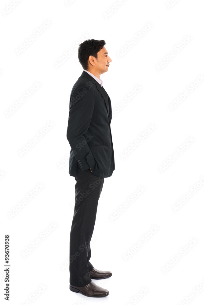 indian business man with coat standing, side view indian business man with coat standing, side view
