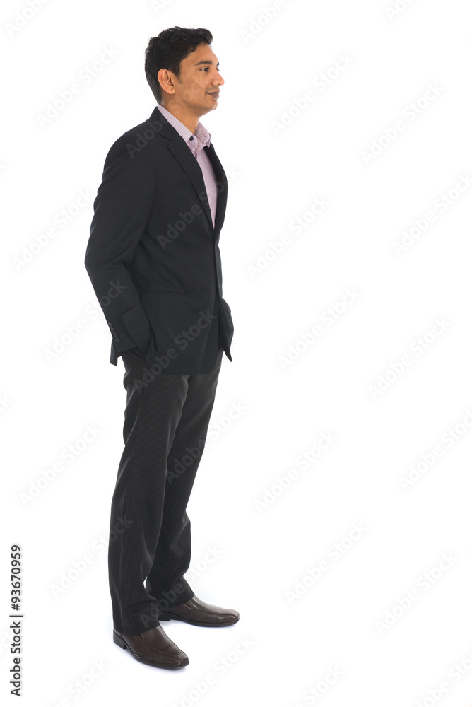 indian business man with coat standing, side view indian business man with coat standing, side view