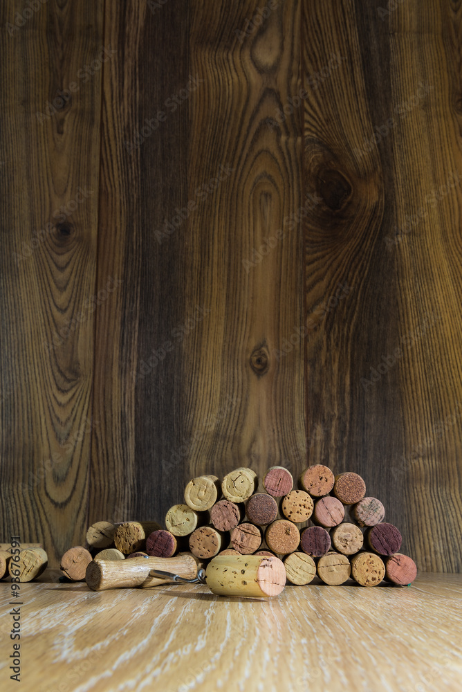 wine cork on a background of boards and corkscrew wine cork on a background of boards and corkscrew